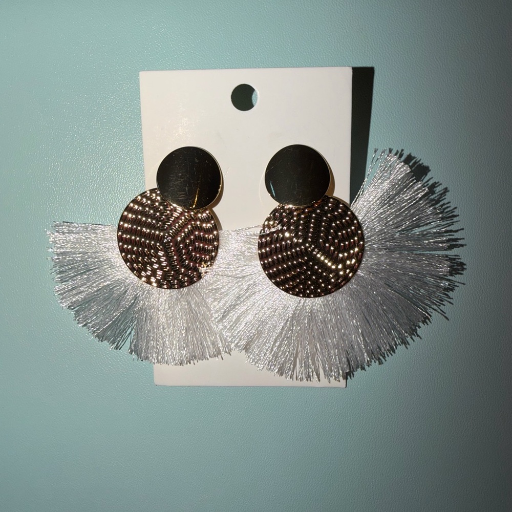 Earrings with white fringe and gold accents